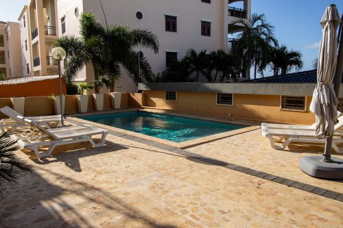 Seaside Apartment Ibis with communal pool and garden view